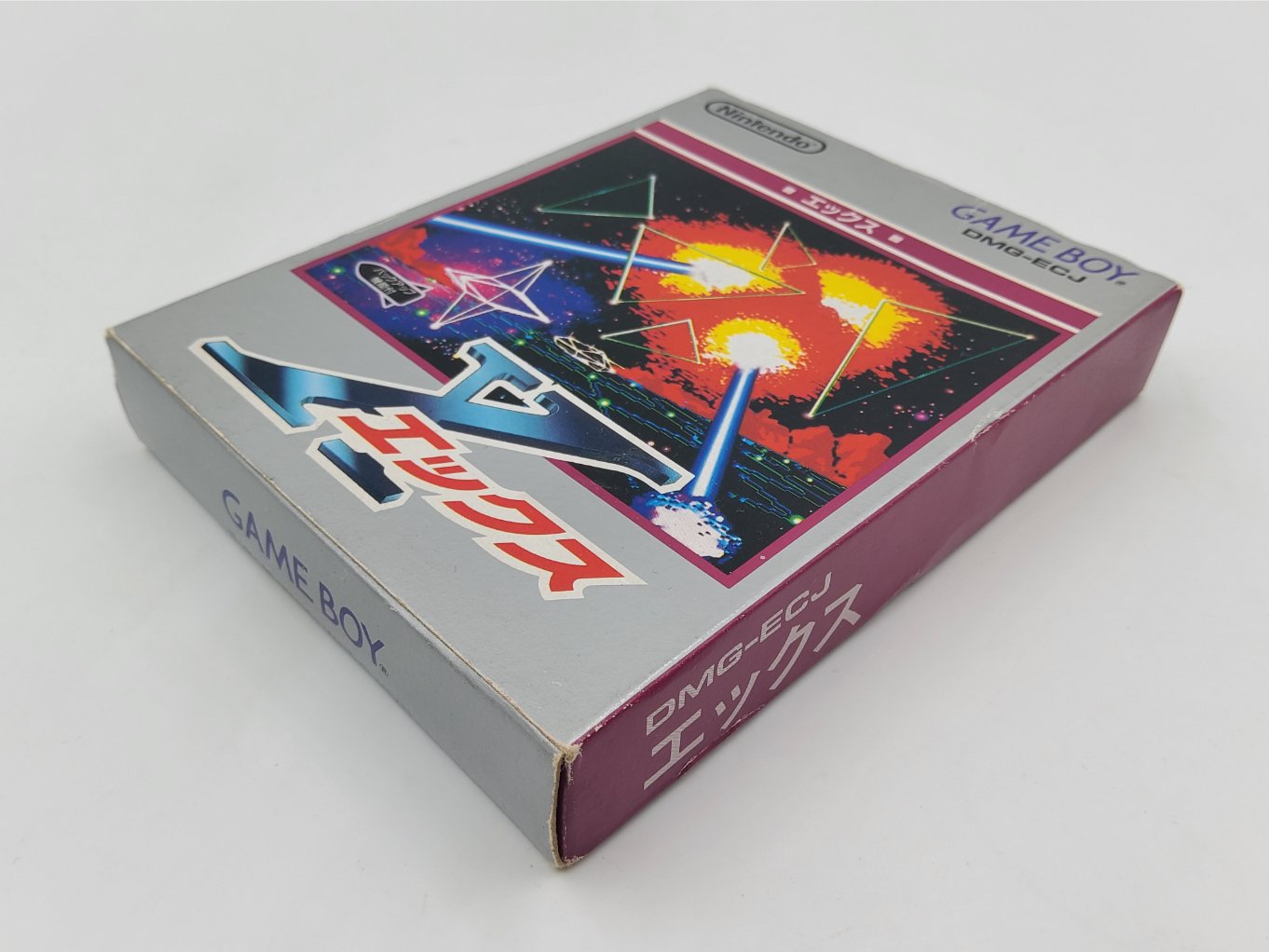 X (Ekkusu) en Boite B00003